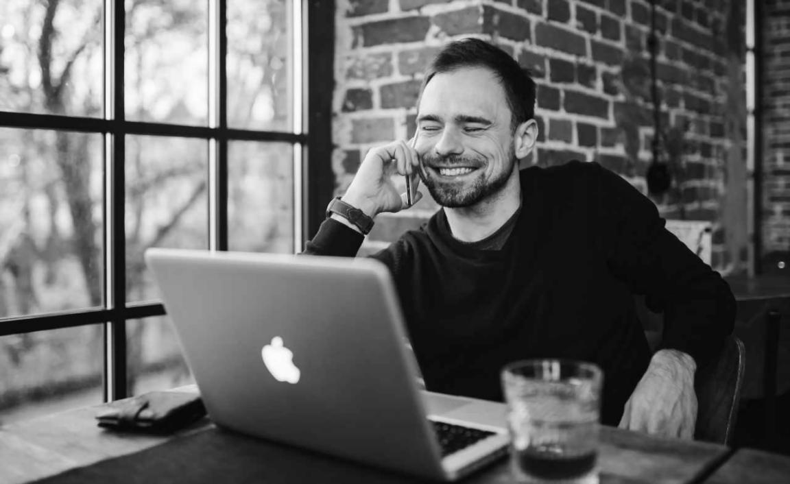 Photography workshop session showing students analyzing composition in urban architecture