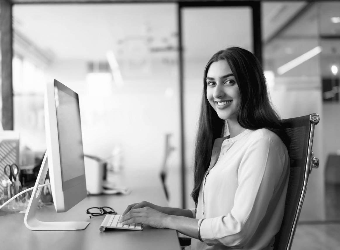 Photographer demonstrating perspective techniques during urban photography workshop