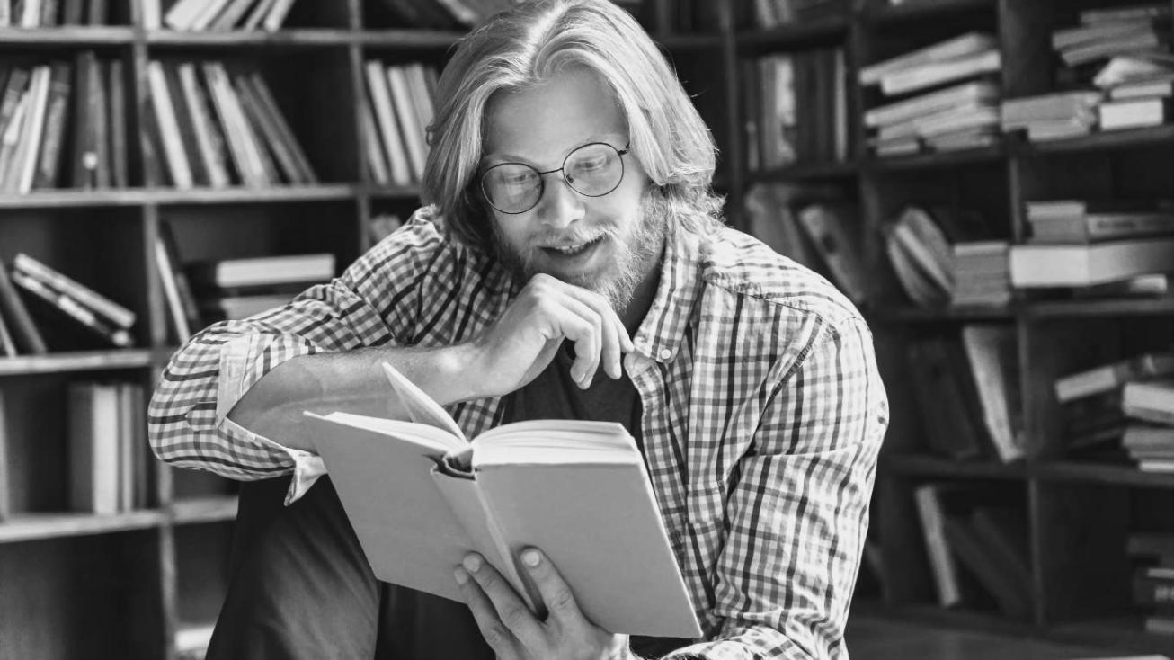 Student reviewing composition principles through annotated photo examples on tablet